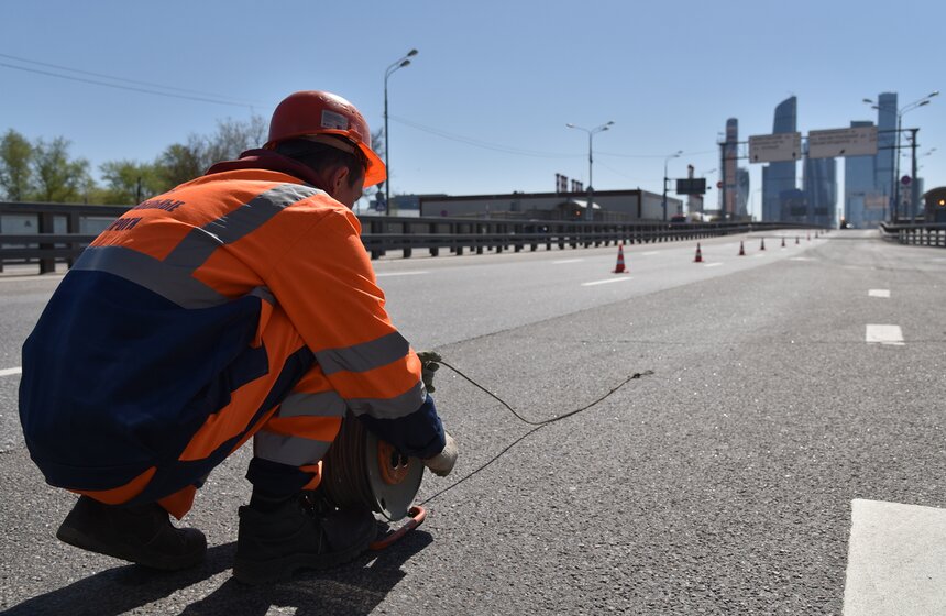 Как обновляют разметку на московских дорогах. Фото 4 фото
