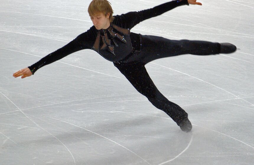 Российский фигурист Евгений Плющенко во время выступления с короткой программой в мужском одиночном катании на XX зимней Олимпиаде. <br />Фото: ТАСС/Федор Савинцев