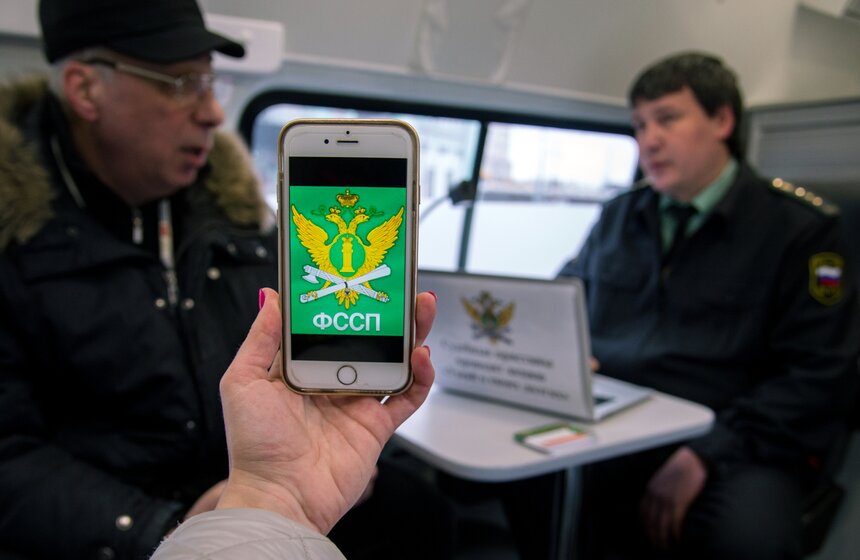 Судебные приставы провели акцию "Узнай о своих долгах" 10 фото