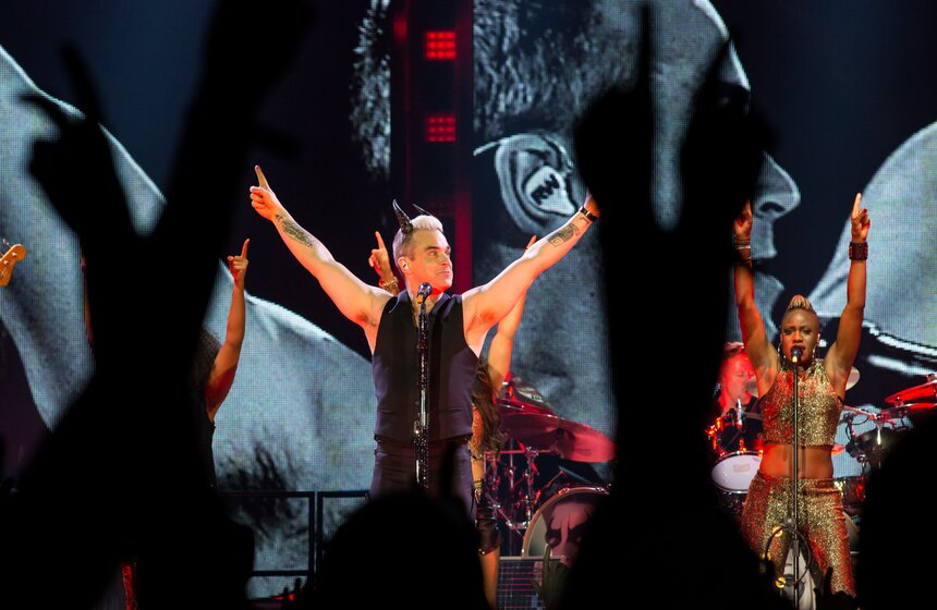 Робби Уильямс спел для московских поклонников в "Олимпийском" 4 фото