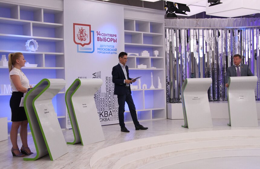 Кандидаты в депутаты Мосгордумы от 27 округа Ольга Щербакова (ЛДПР) и Степан Орлов ("Единая Россия")